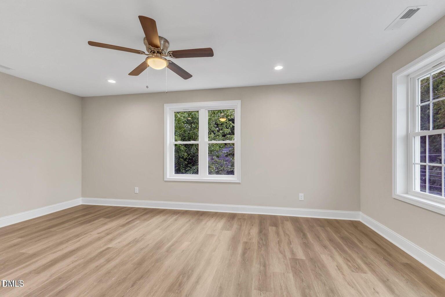 1521 Chapel Hill Road Durham, NC 27701 - Photo 23 of 42 wooden floor in an empty room with a window