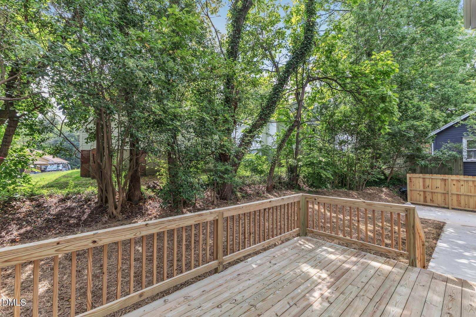 1521 Chapel Hill Road Durham, NC 27701 - Photo 34 of 42 a view of deck with wooden floor and outdoor seating