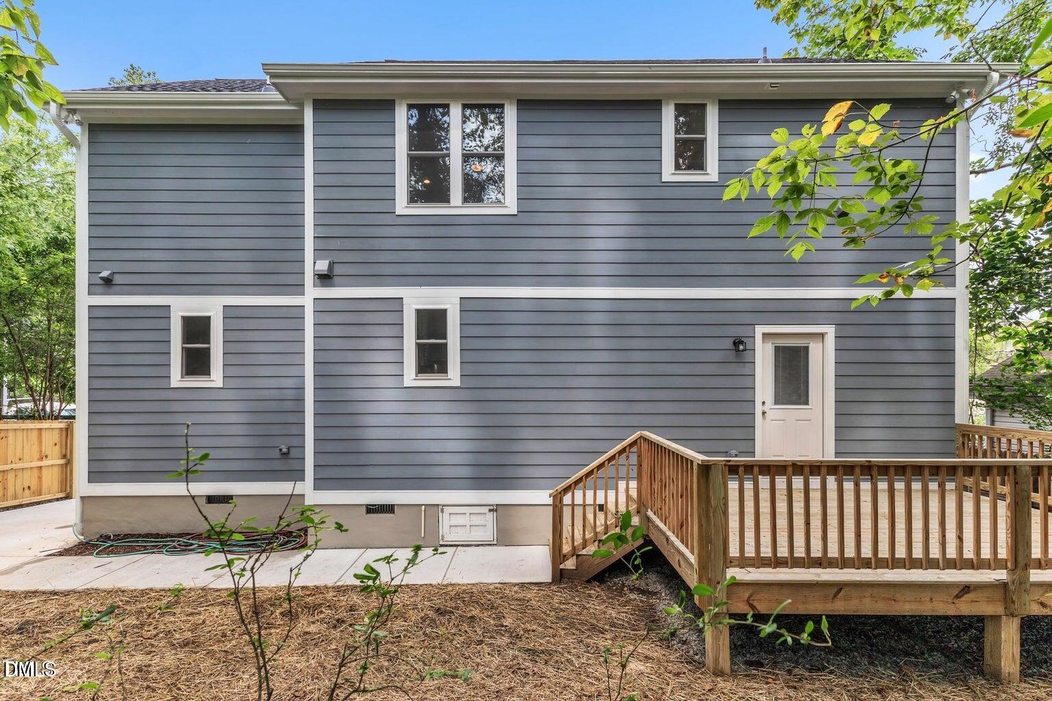1521 Chapel Hill Road Durham, NC 27701 - Photo 37 of 42 a view of a house with a window and wooden fence