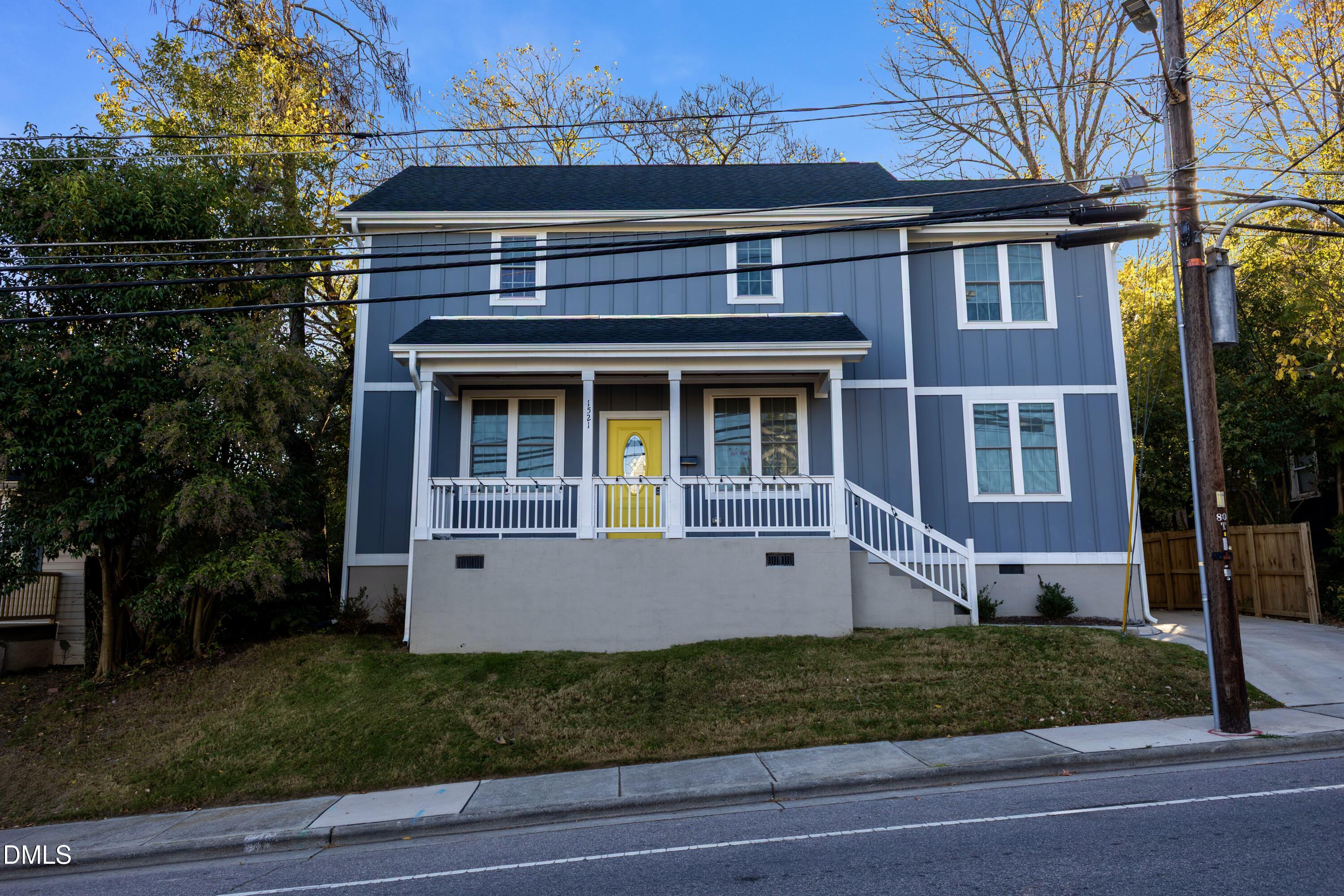 1521 Chapel Hill Road Durham, NC 27701 - Photo 5 of 42 a view of house with a yard