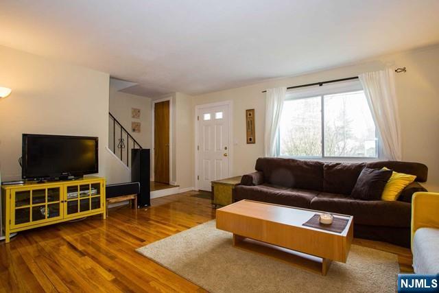 36 Morningside Avenue Cresskill, NJ 07626 - Photo 3 of 17 a living room with furniture and a flat screen tv