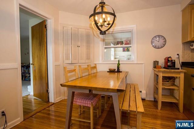 36 Morningside Avenue Cresskill, NJ 07626 - Photo 6 of 17 a view of a dining room with furniture and wooden floor