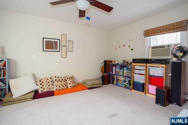 36 Morningside Avenue Cresskill, NJ 07626 - Photo 9 of 17 a bed room with a bed and a couch