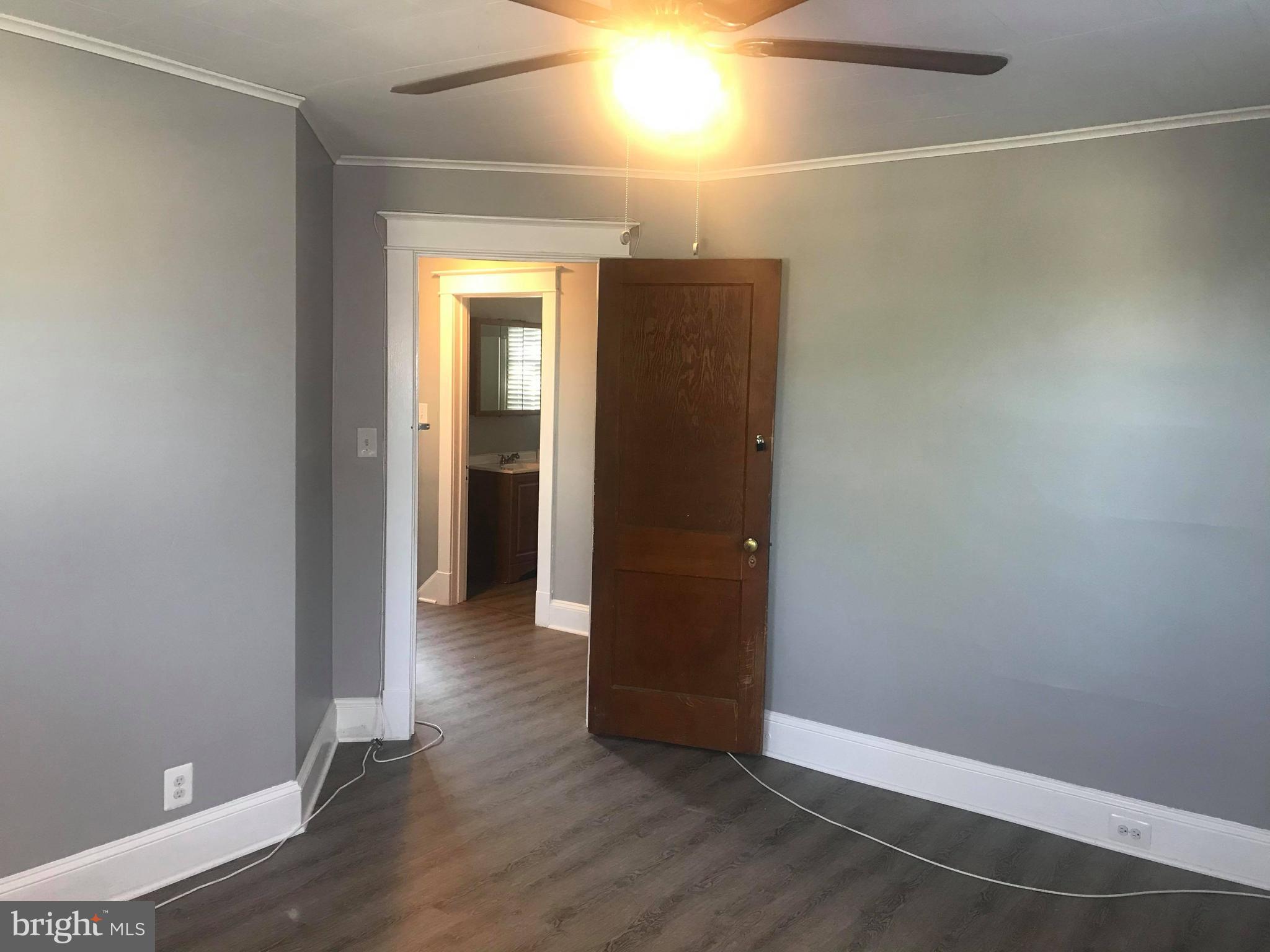 12 Leeway Dundalk, MD 21222 - Photo 12 of 24 a view of hallway with wooden floor