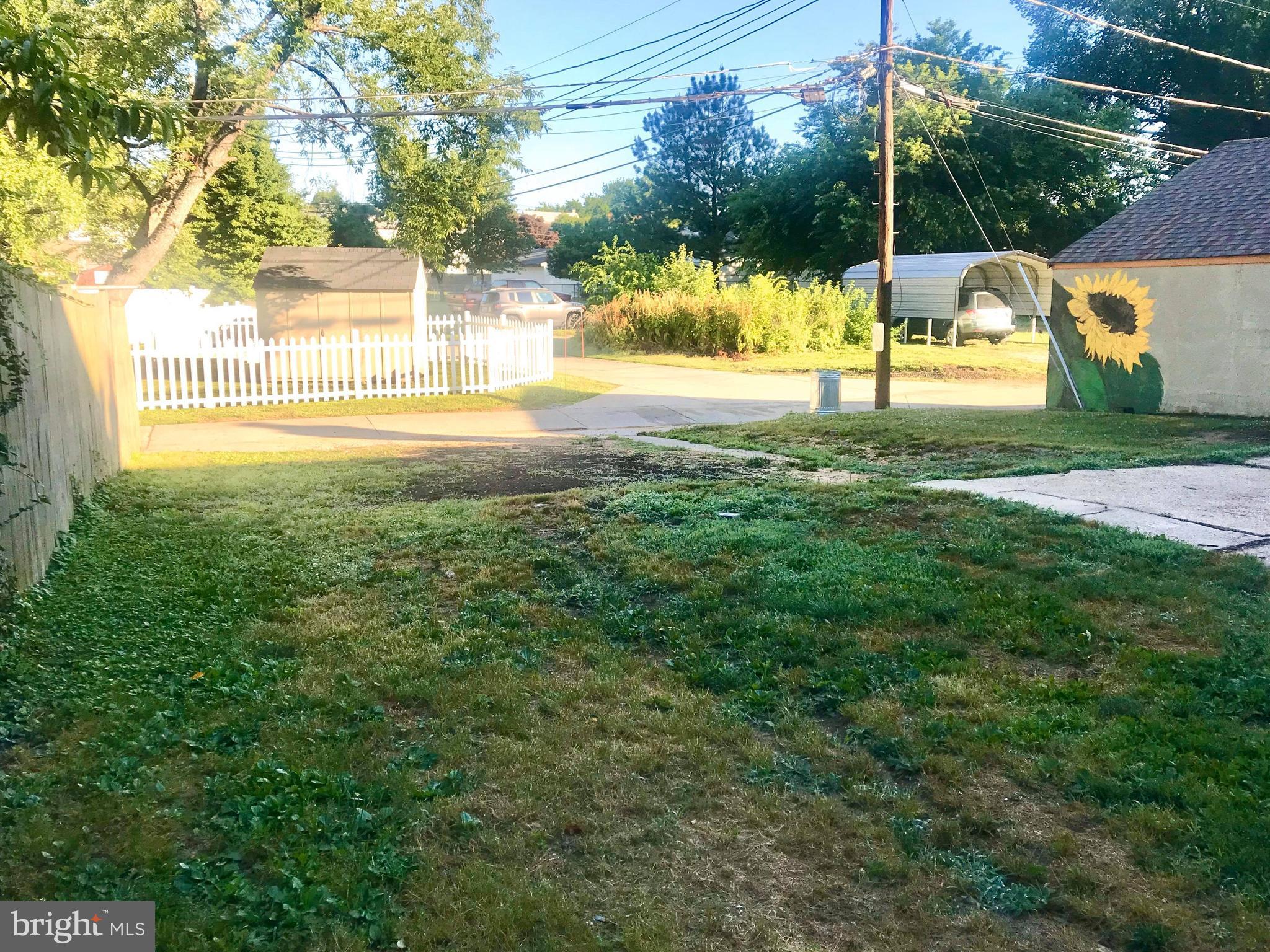12 Leeway Dundalk, MD 21222 - Photo 14 of 24 a view of swimming pool with a yard and palm trees