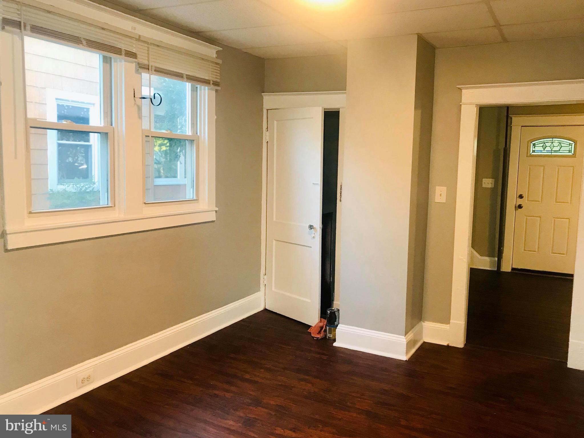 12 Leeway Dundalk, MD 21222 - Photo 10 of 24 an empty room with wooden floor and windows