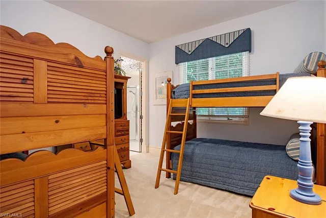 a bedroom with a bed and a closet