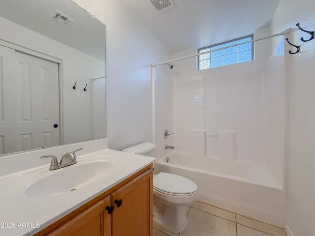 an empty room that has a window