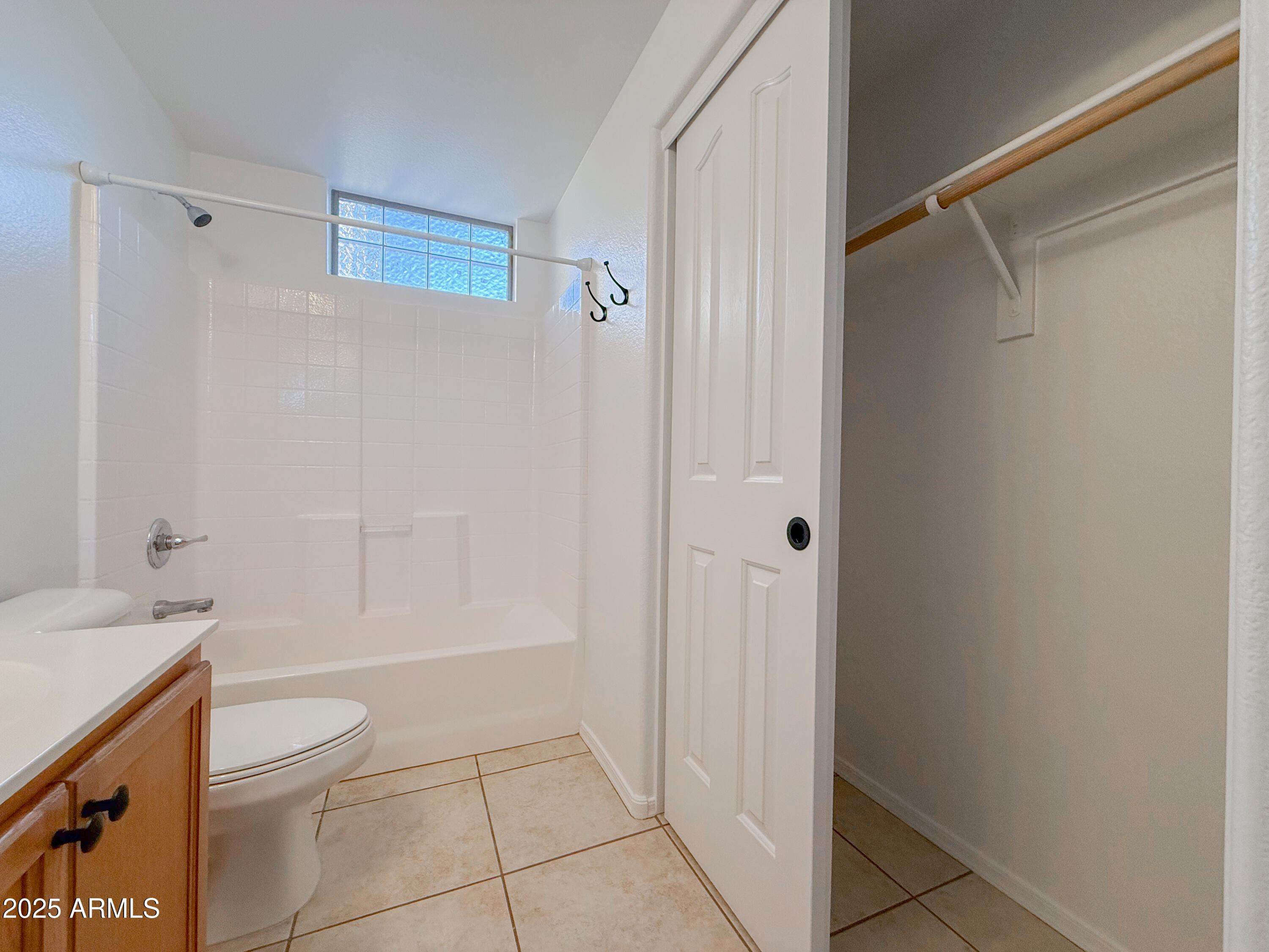 2150 West Alameda Road, Unit 1390 Phoenix, AZ 85085 - Photo 15 of 28 a bathroom with a granite countertop bathtub shower sink vanity and toilet