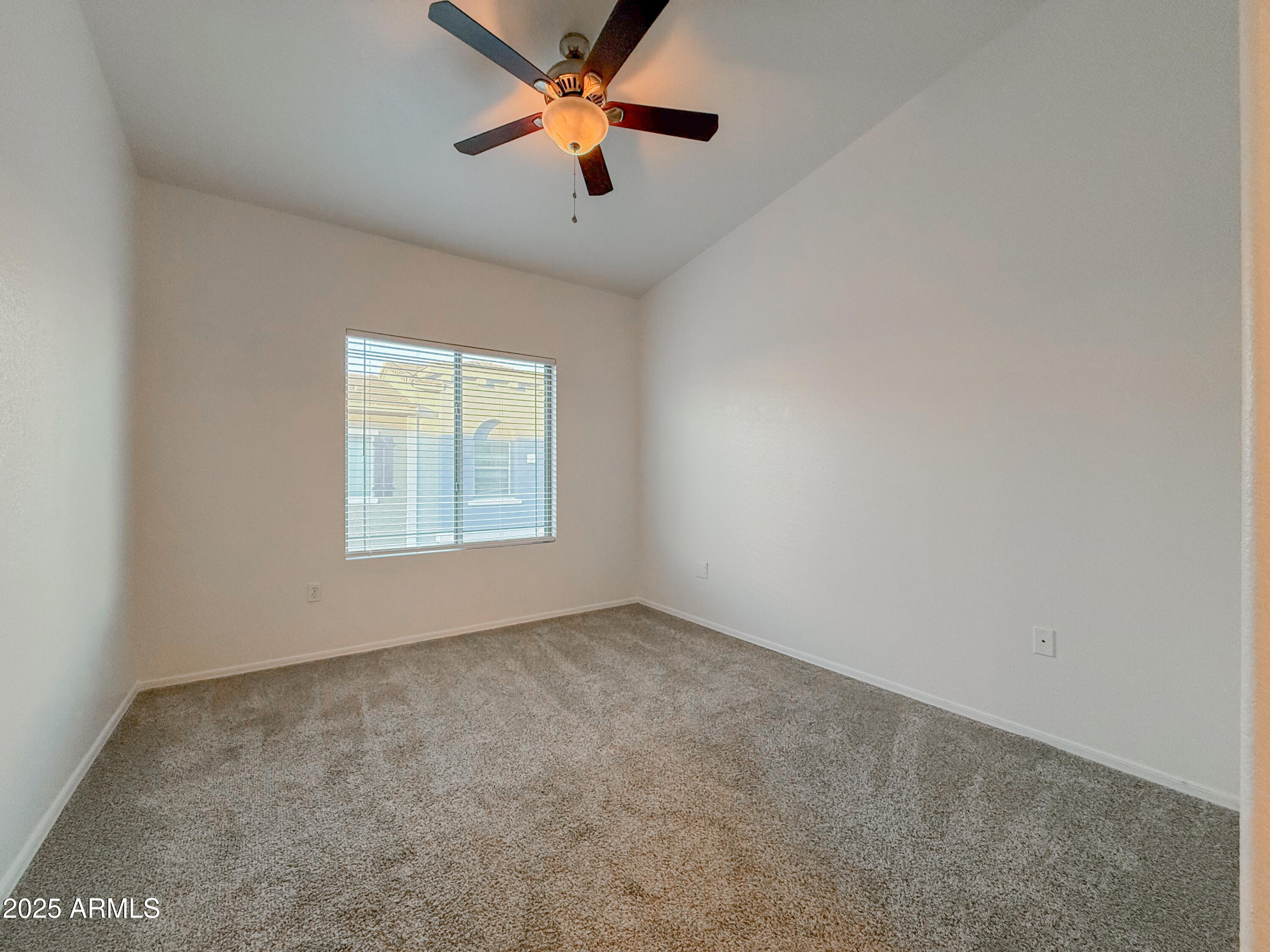 2150 West Alameda Road, Unit 1390 Phoenix, AZ 85085 - Photo 17 of 28 an empty room with windows and fan