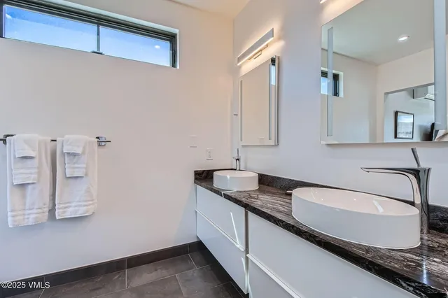 a view of a chairs and table on the deck