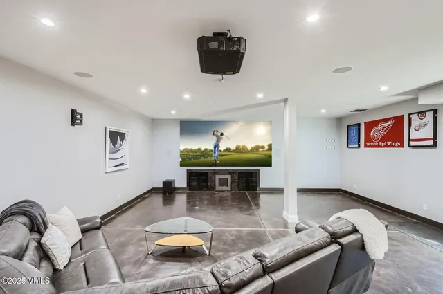 an aerial view of a house with a ocean view