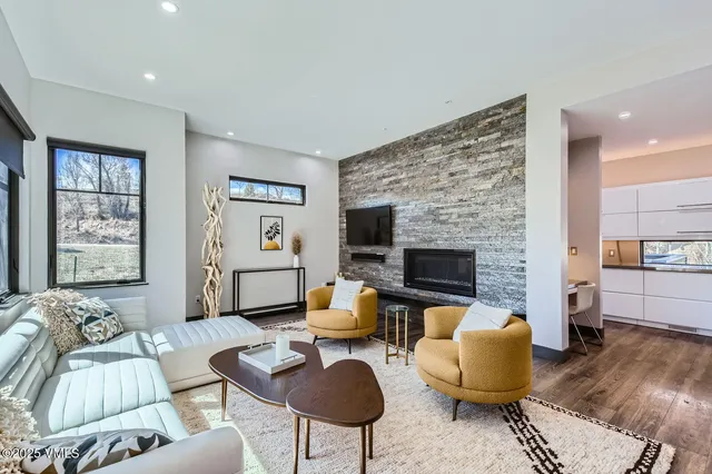 a kitchen with a sink a counter top space and appliances
