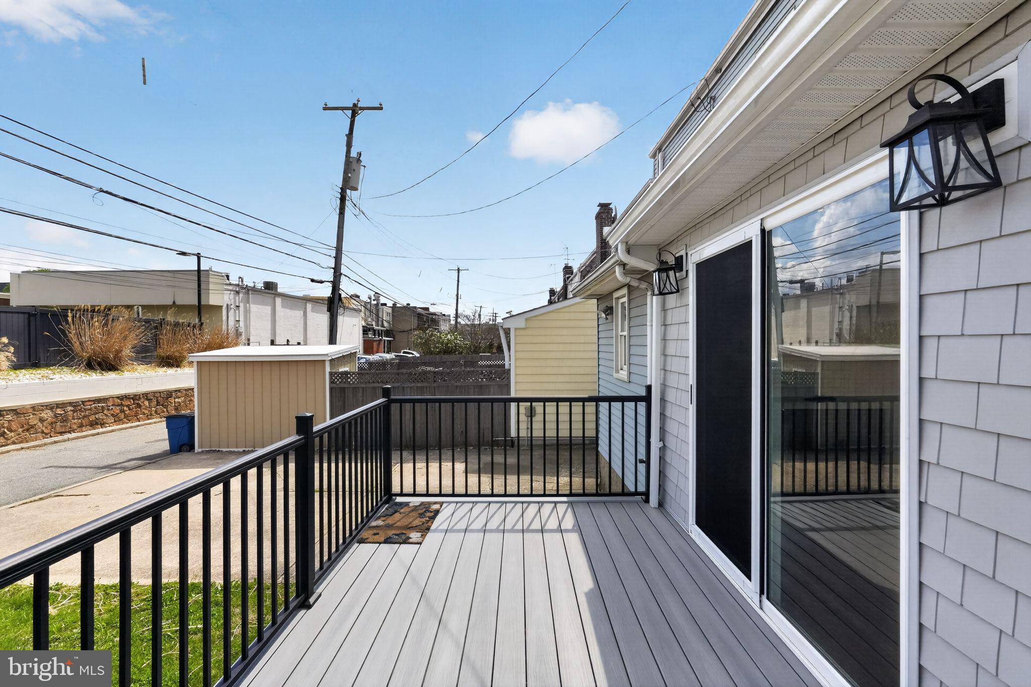 633 Dayton Road Bryn Mawr, PA 19010 - Photo 14 of 18 a view of a balcony with wooden floor