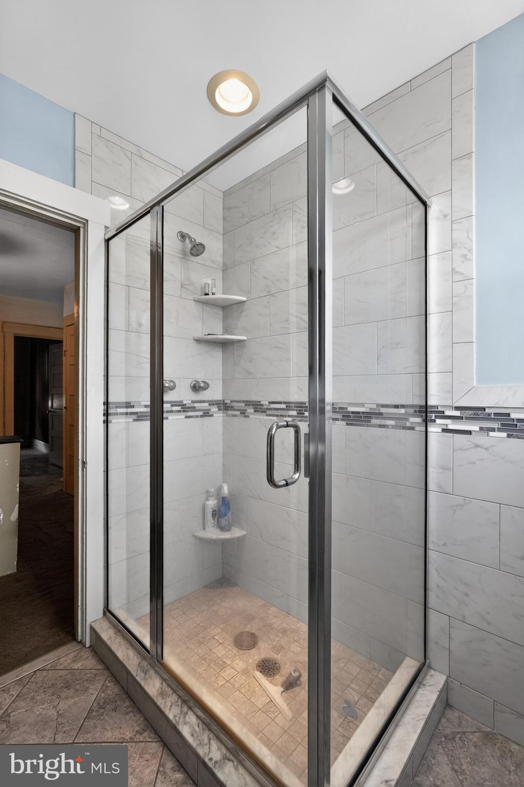 633 Dayton Road Bryn Mawr, PA 19010 - Photo 10 of 18 a bathroom with a glass shower door