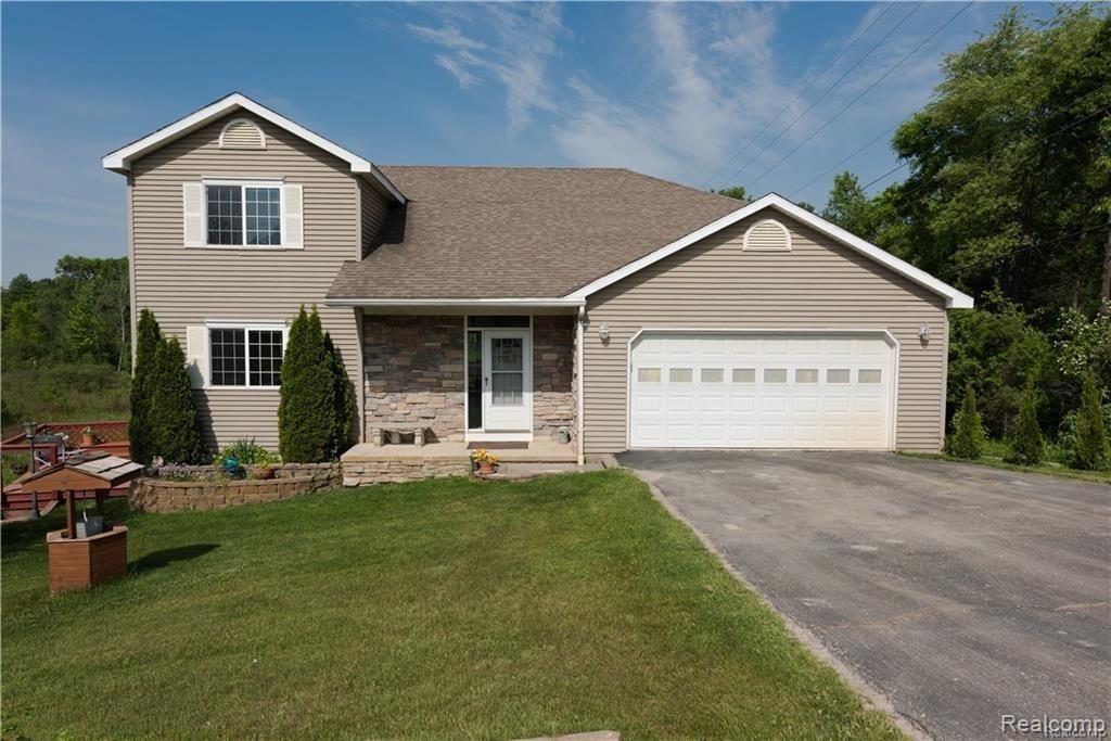 9430 Chambers Road Pinckney, MI 48169 - Photo 1 of 55 9430 Chambers Front (1).jpg