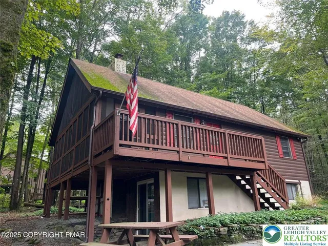 a view of a house with a balcony