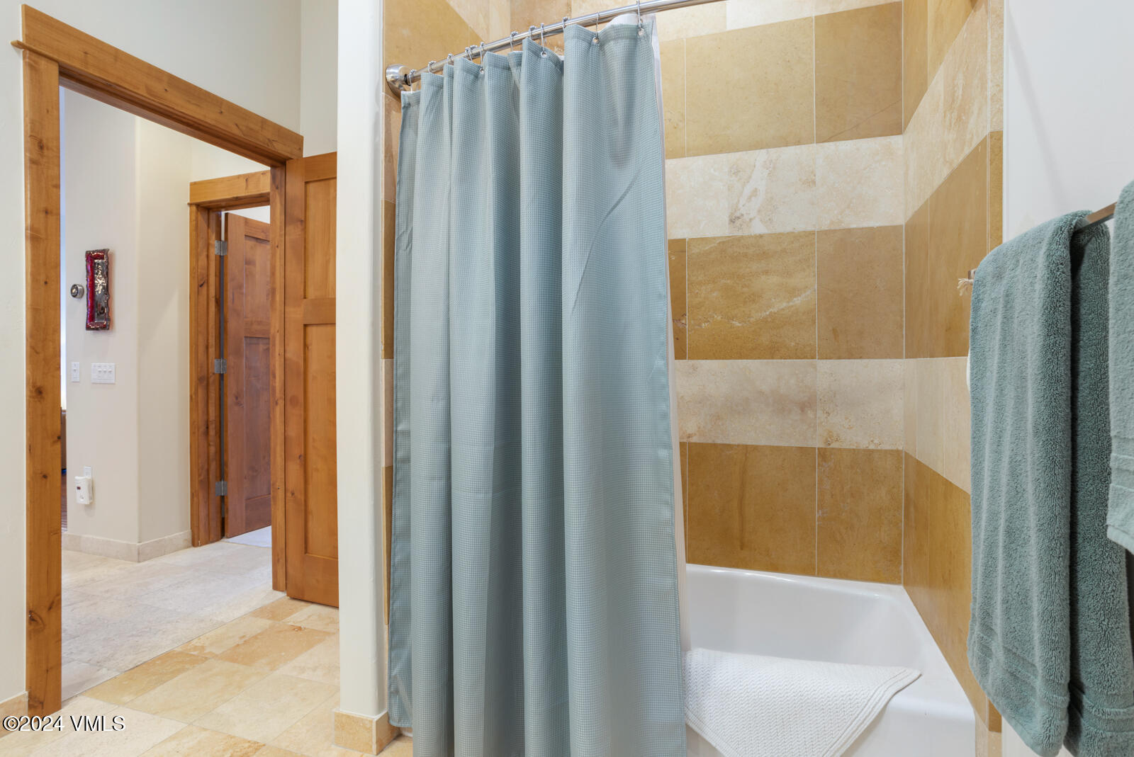 295 Main Street, Unit R202 Edwards, CO 81632 - Photo 20 of 26 a view of a bathroom with a shower and a toilet