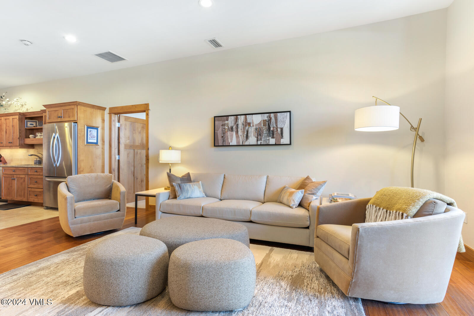 295 Main Street, Unit R202 Edwards, CO 81632 - Photo 2 of 26 a living room with furniture and a couch