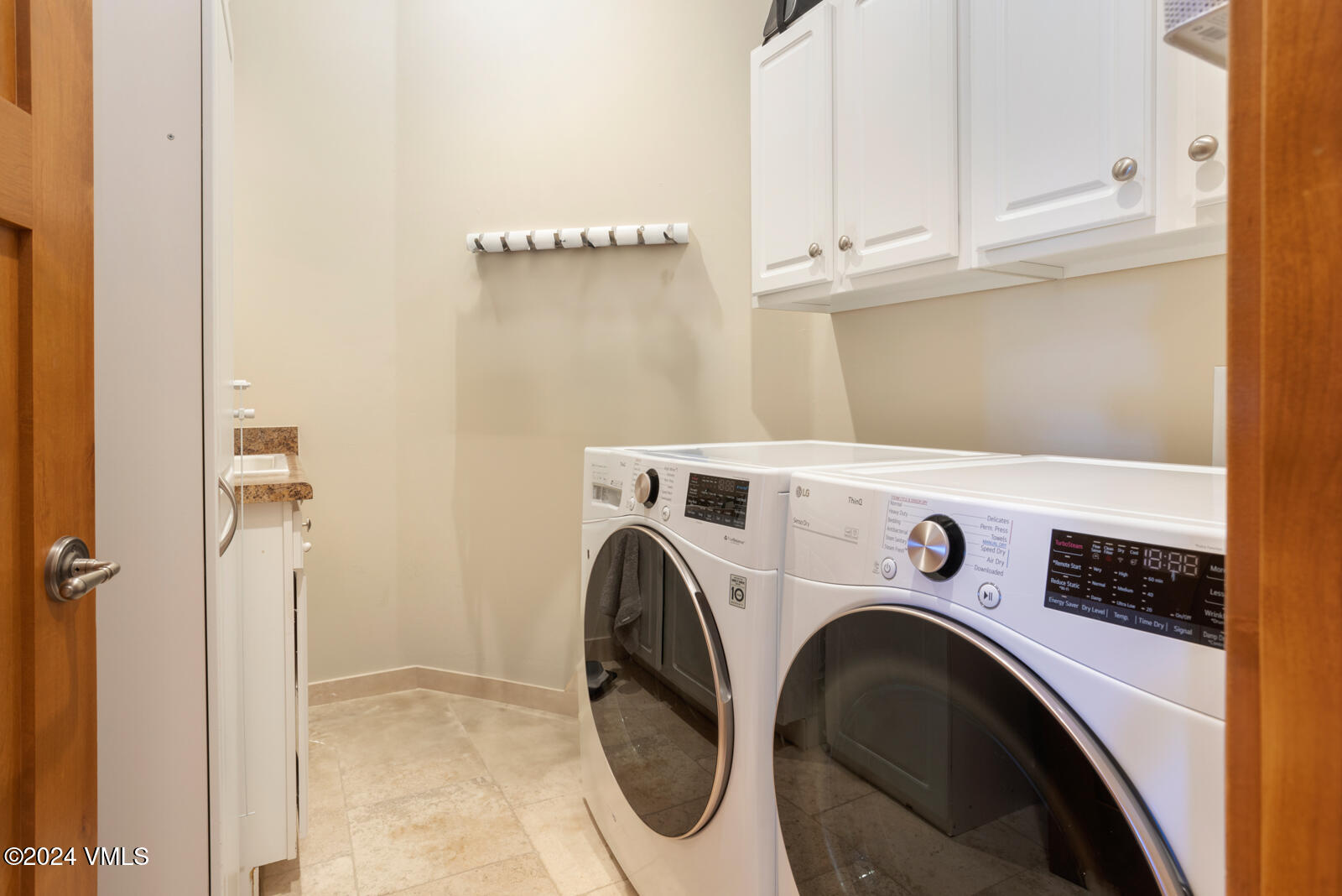 295 Main Street, Unit R202 Edwards, CO 81632 - Photo 21 of 26 a utility room with dryer and washer