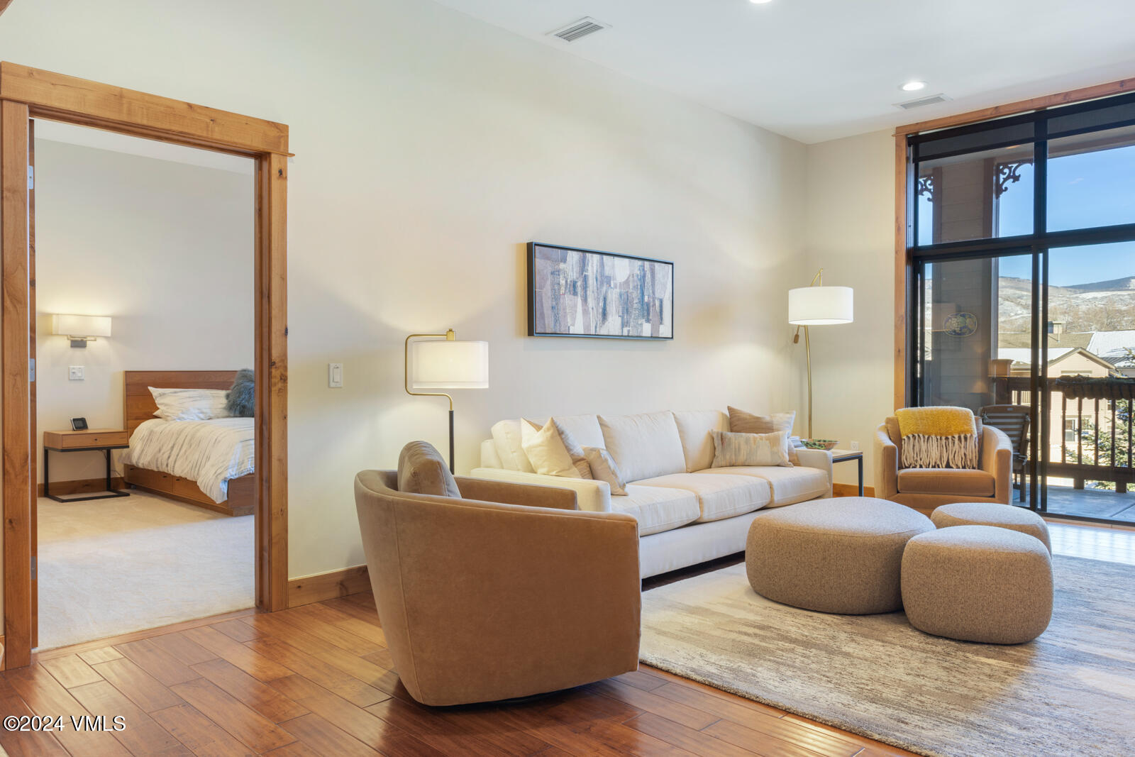 295 Main Street, Unit R202 Edwards, CO 81632 - Photo 7 of 26 a living room with furniture and a large window