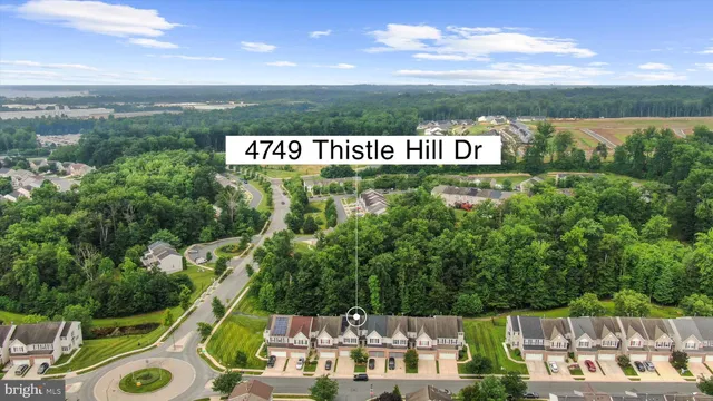 a view of a park with an outdoor seating