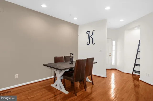 a workspace with furniture and wooden floor