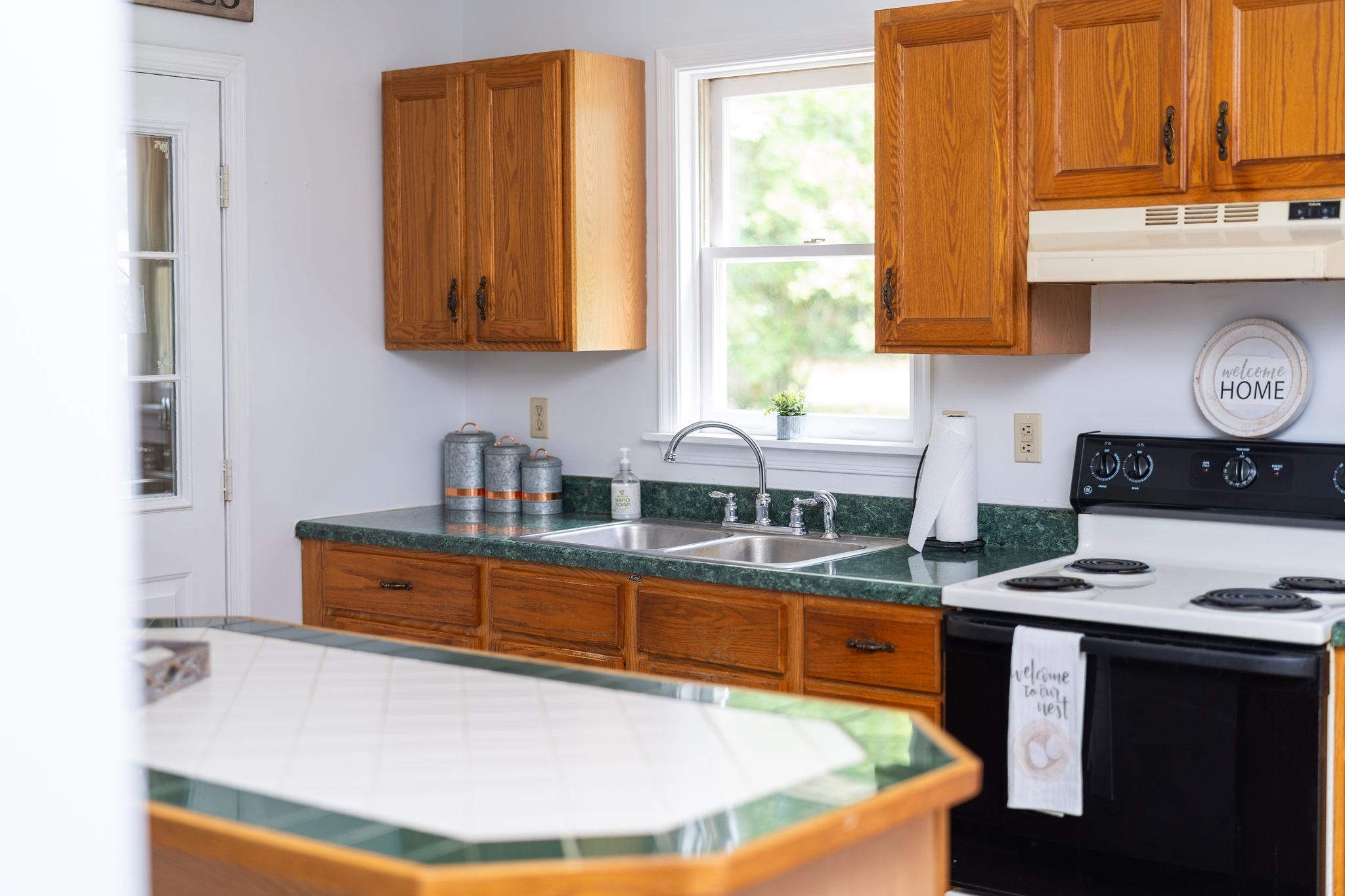 87 Swisher Road Staunton, VA 24401 - Photo 23 of 75 a kitchen with stainless steel appliances granite countertop a sink counter space and a window
