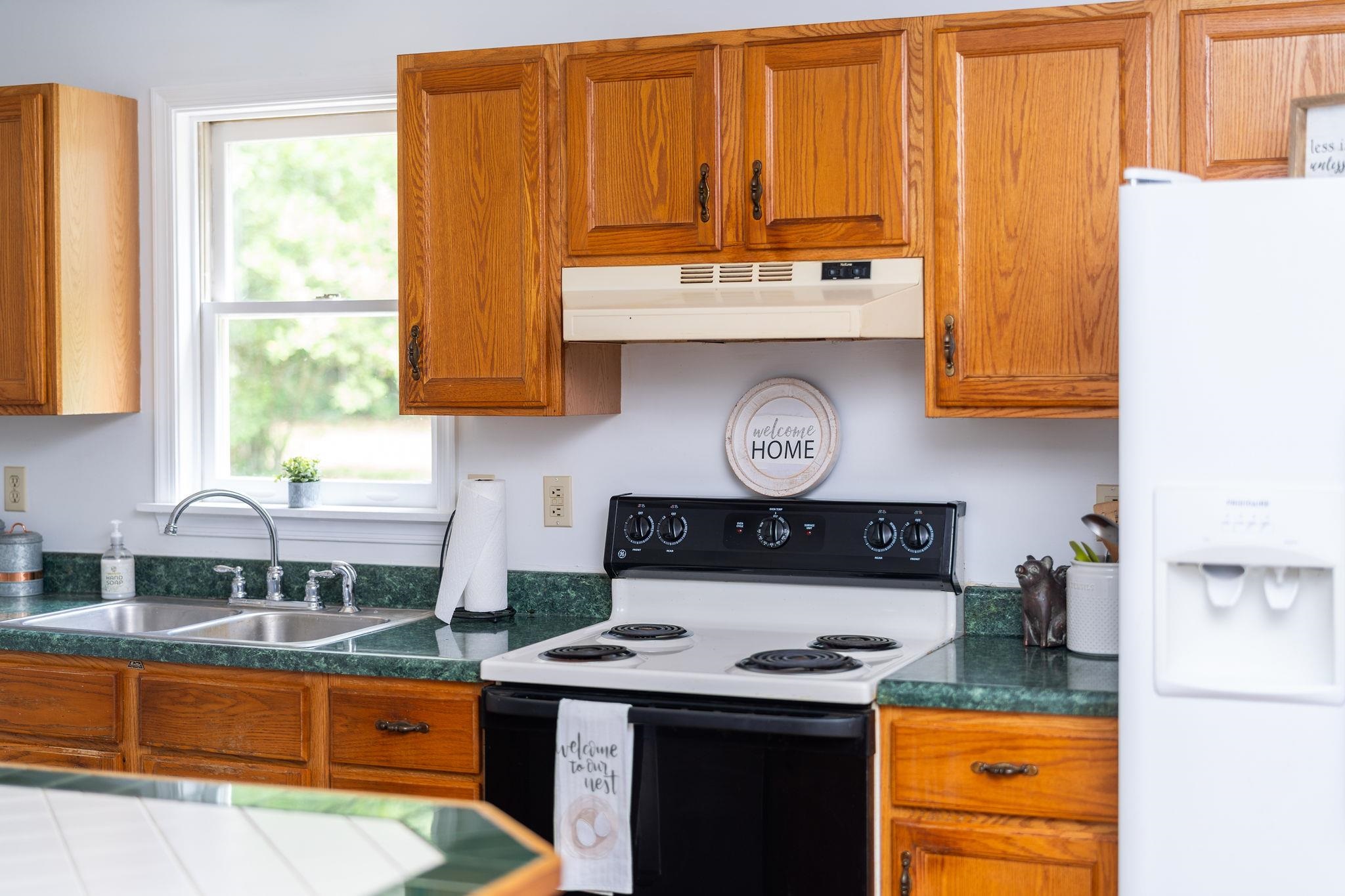 87 Swisher Road Staunton, VA 24401 - Photo 29 of 75 a kitchen with stainless steel appliances granite countertop a stove and a microwave