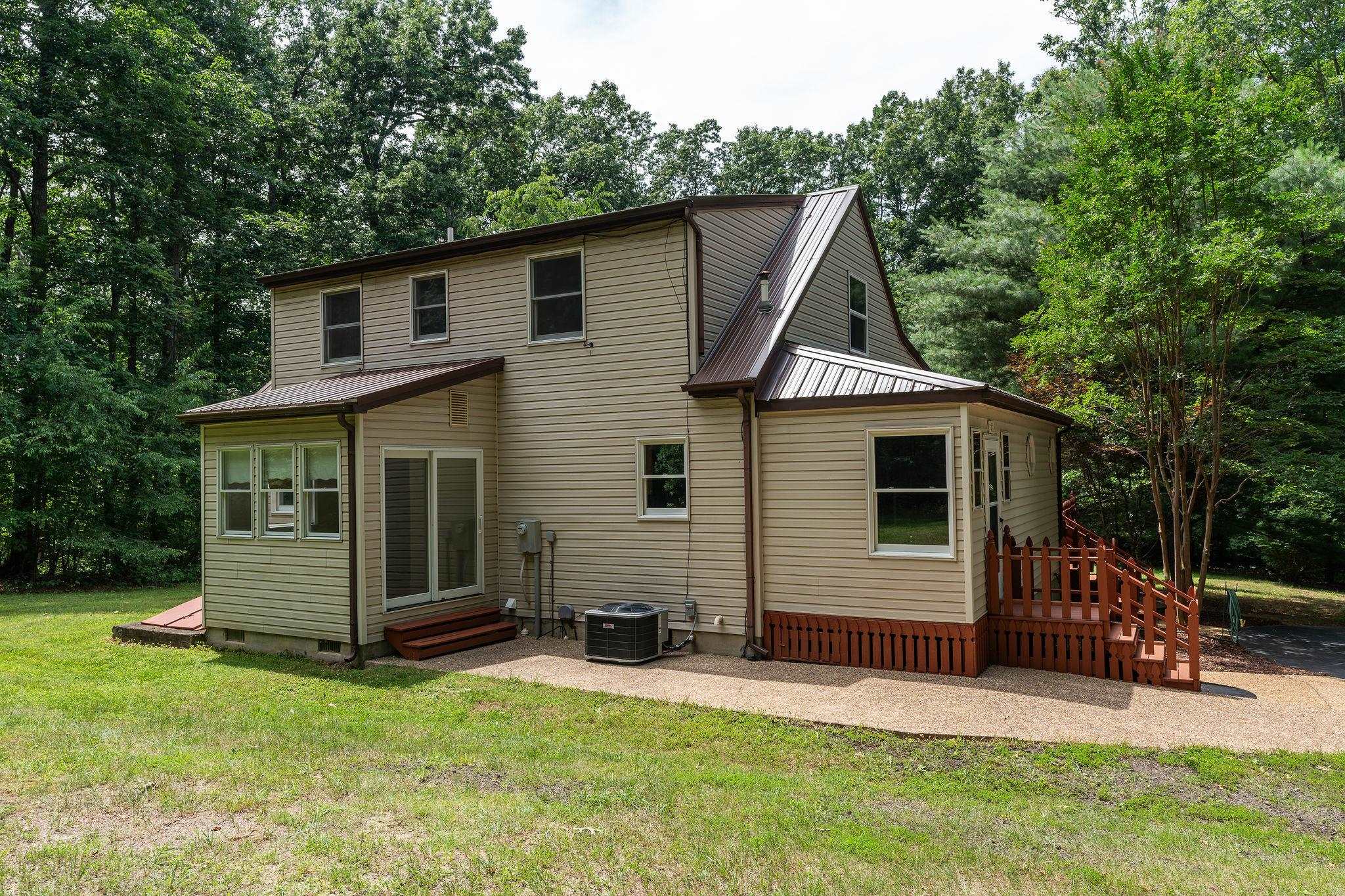 87 Swisher Road Staunton, VA 24401 - Photo 5 of 75 a front view of a house with a yard
