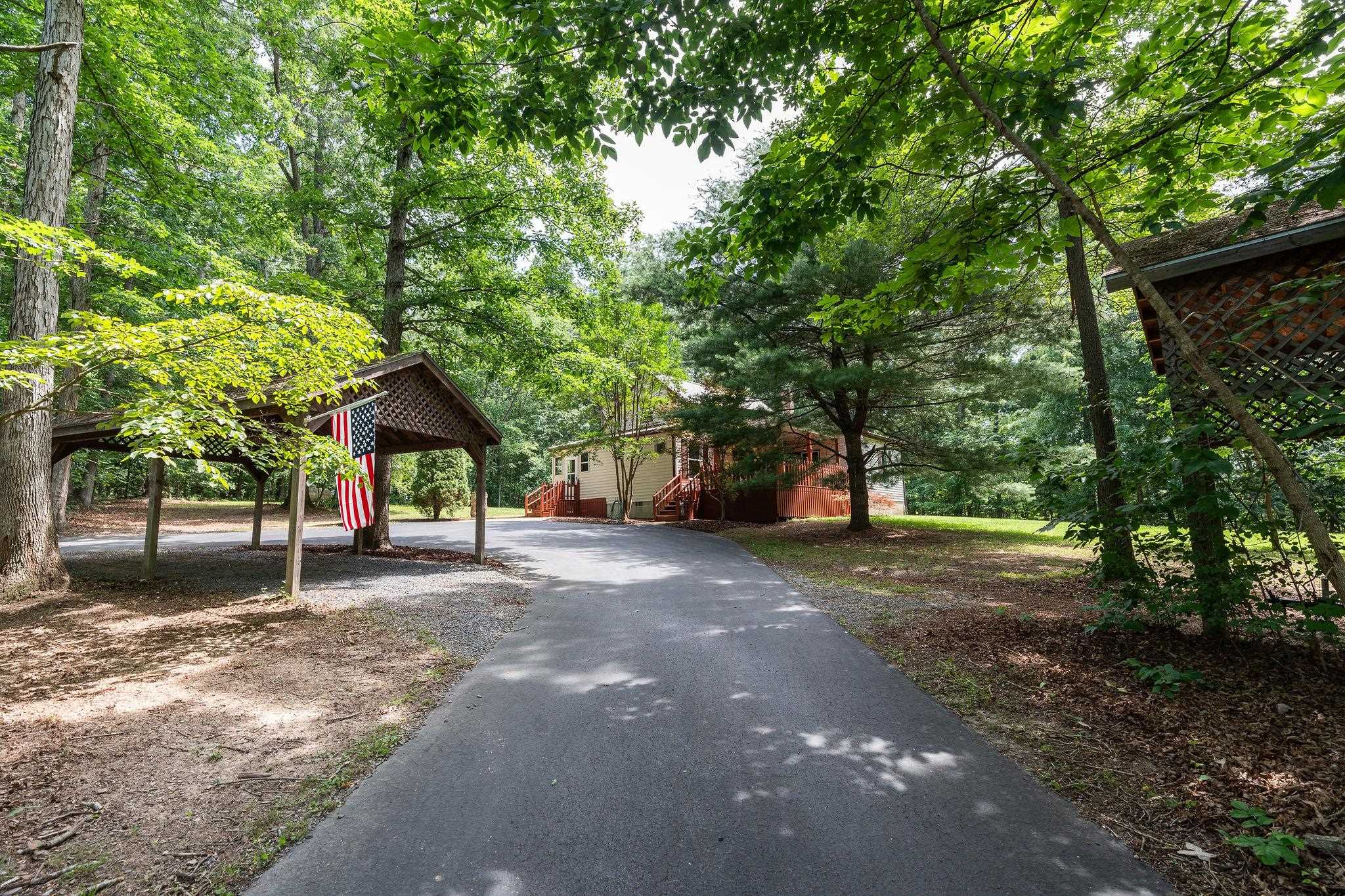 87 Swisher Road Staunton, VA 24401 - Photo 54 of 75 a house with trees in front of it