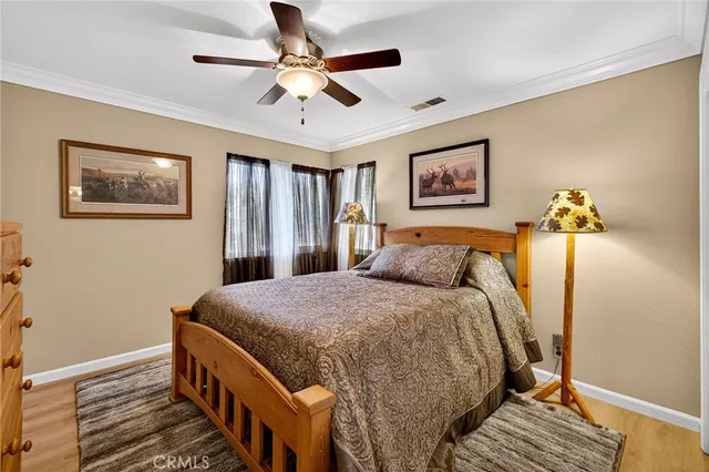 an aerial view of a house with yard