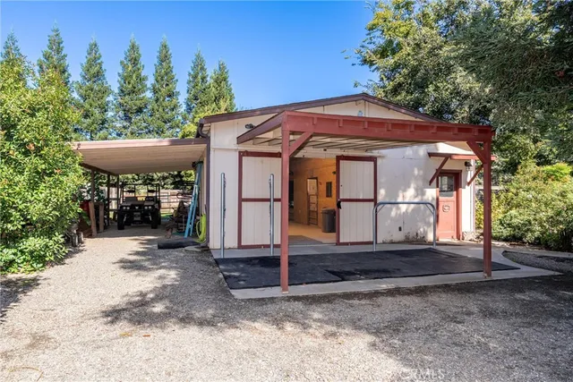 a view of a park with swings and slides