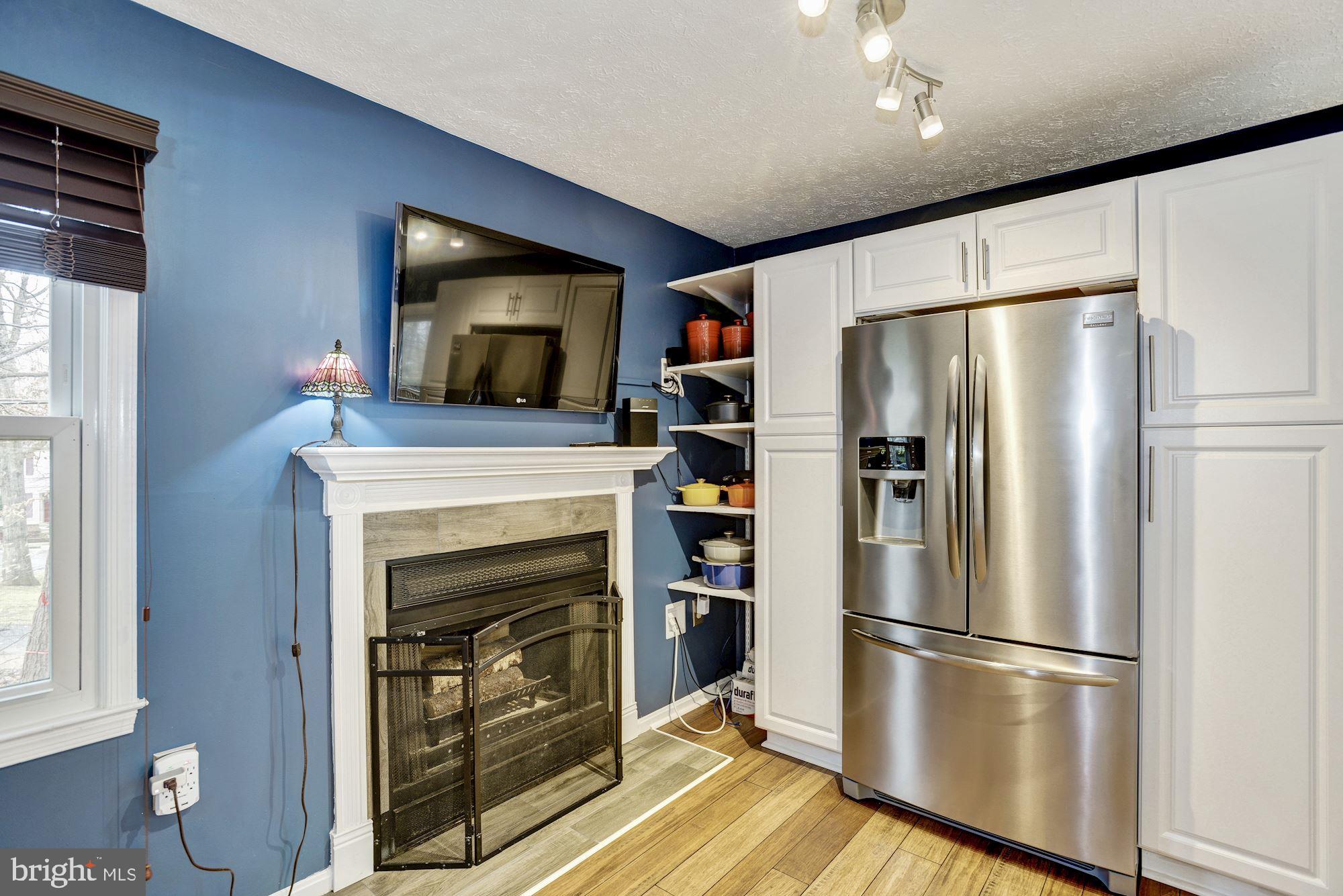 7342 Stream Way Springfield, VA 22152 - Photo 16 of 42 One of two fireplaces