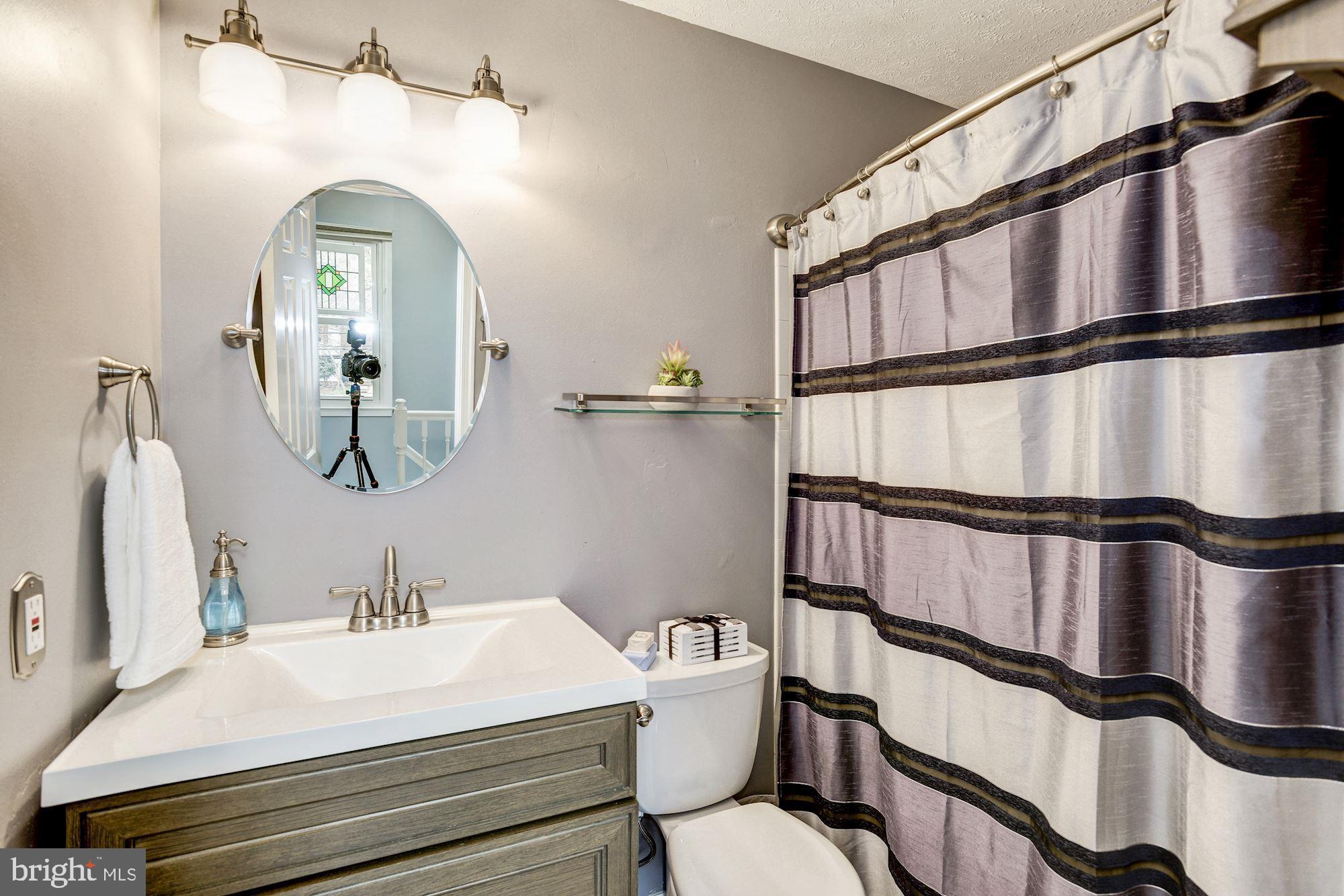 7342 Stream Way Springfield, VA 22152 - Photo 31 of 42 Upper-level hall bath