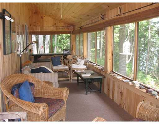 89 Lower Road Lakeville, ME 04487 - Photo 12 of 25 Other. Screened porch full length of...