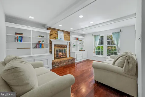 a view of a storage and utility room with washer and dryer