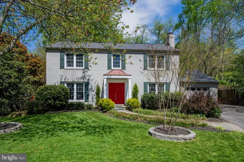 a view of entryway with wooden floor and stairs