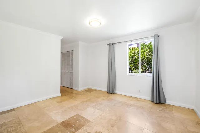 a bathroom with a sink a mirror and a shower