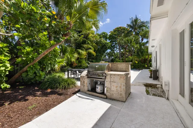 a view of table and chairs in patio