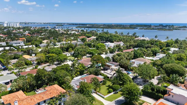 an aerial view of a house with a garden