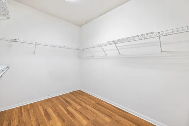 a view of a room with racks on the wall