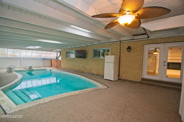 a view of a livingroom with furniture and window