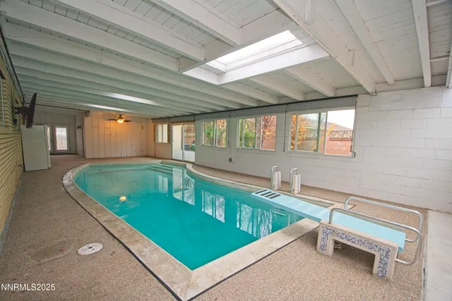 a kitchen with a sink a counter top space and a window
