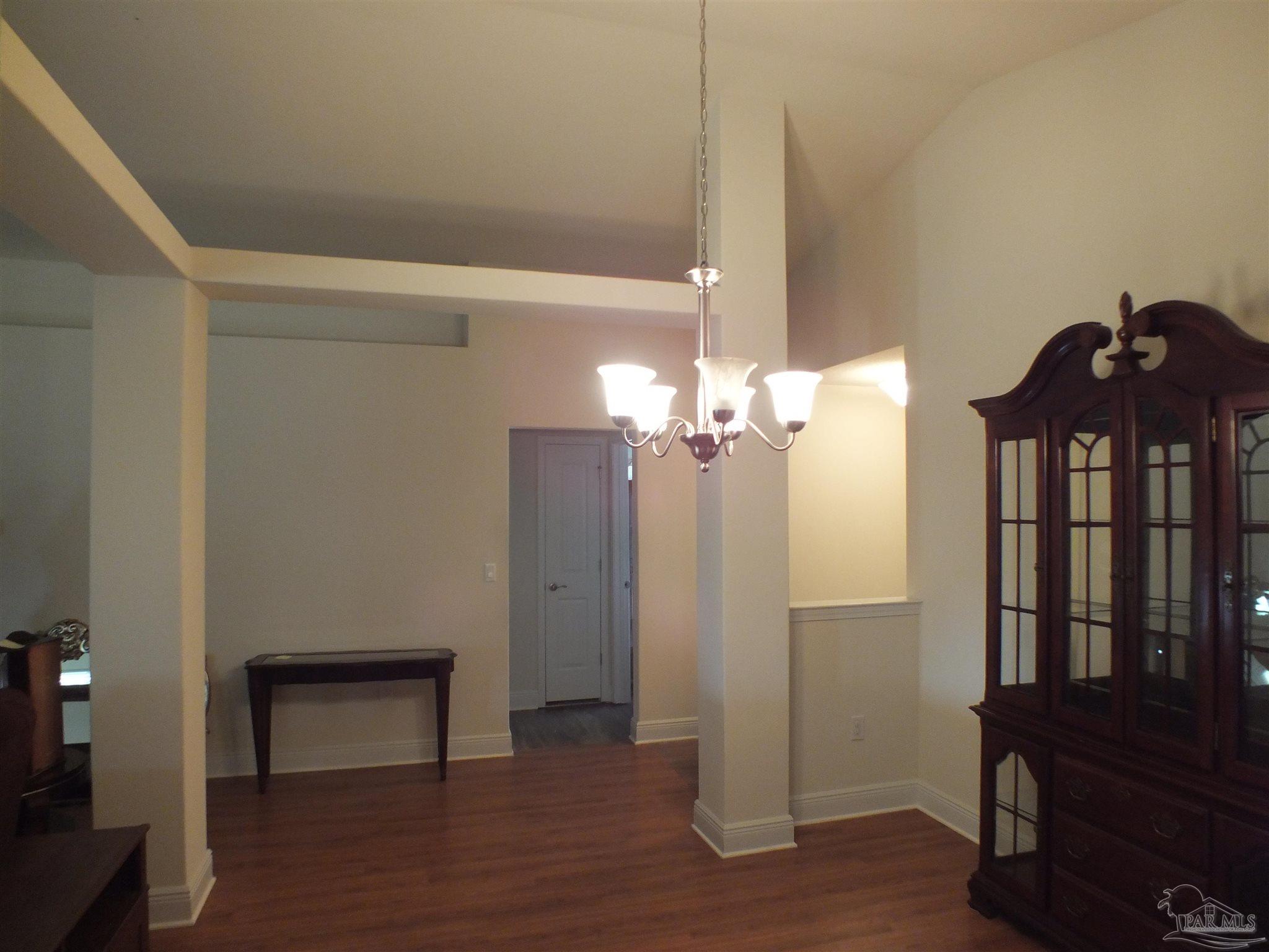 4441 Fiske Street Pace, FL 32571 - Photo 7 of 16 a view of a livingroom with a workspace