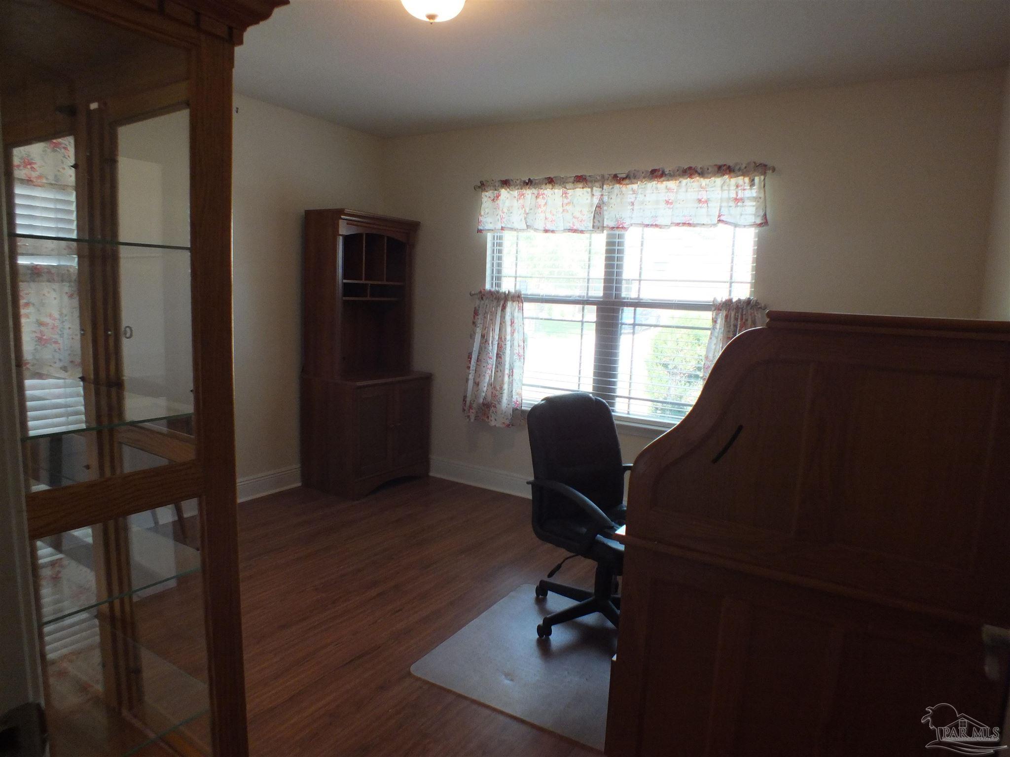 4441 Fiske Street Pace, FL 32571 - Photo 8 of 16 a workspace with a window