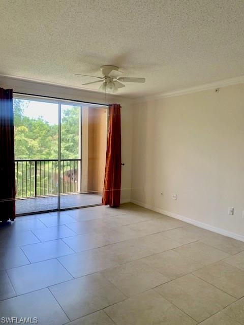 1180 Reserve Way, Unit 206 Naples, FL 34105 - Photo 4 of 22 a view of an empty room with a fireplace