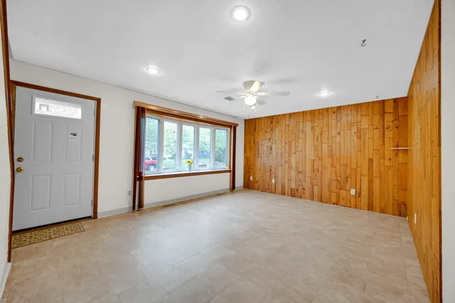 an empty room with windows