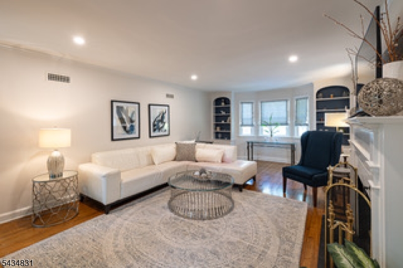 200 Wychwood Road Westfield, NJ 07090 - Photo 2 of 31 a living room with furniture and a lamp
