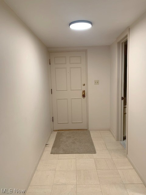 2385 Covington Road, Unit 302 Akron, OH 44313 - Photo 8 of 19 Hallway with light tile floors